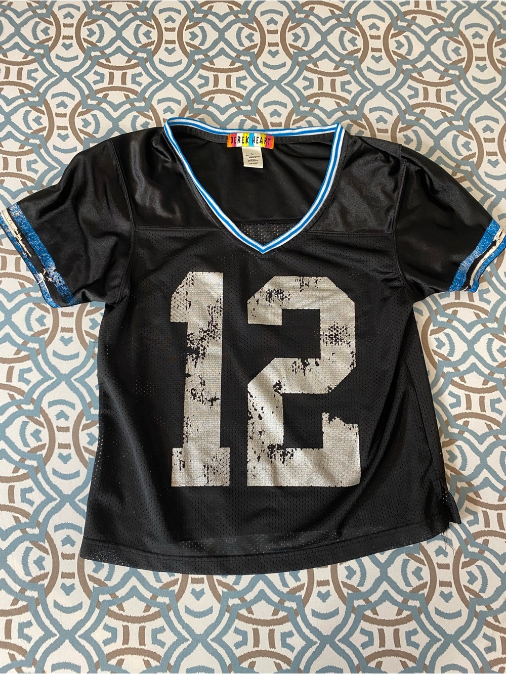 Derek Heart Black Top with Multicolor Label and Blue Trim